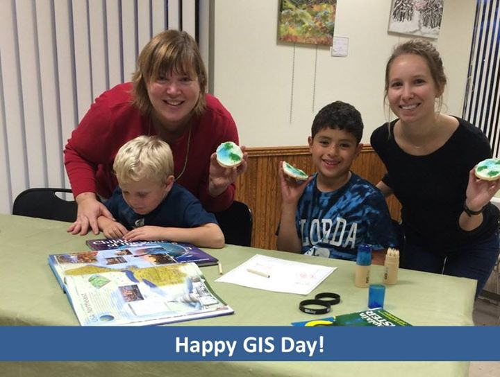 Kids and adults celebrating GIS Day!